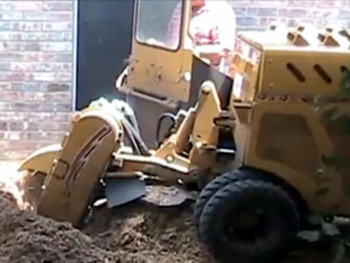 stump grinder in action